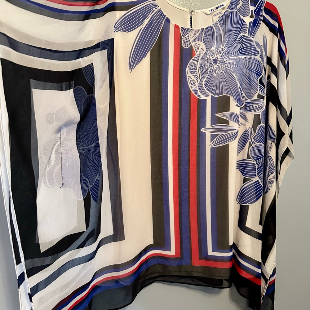 Cleaning out my closet 
Red white black and blue tunic
